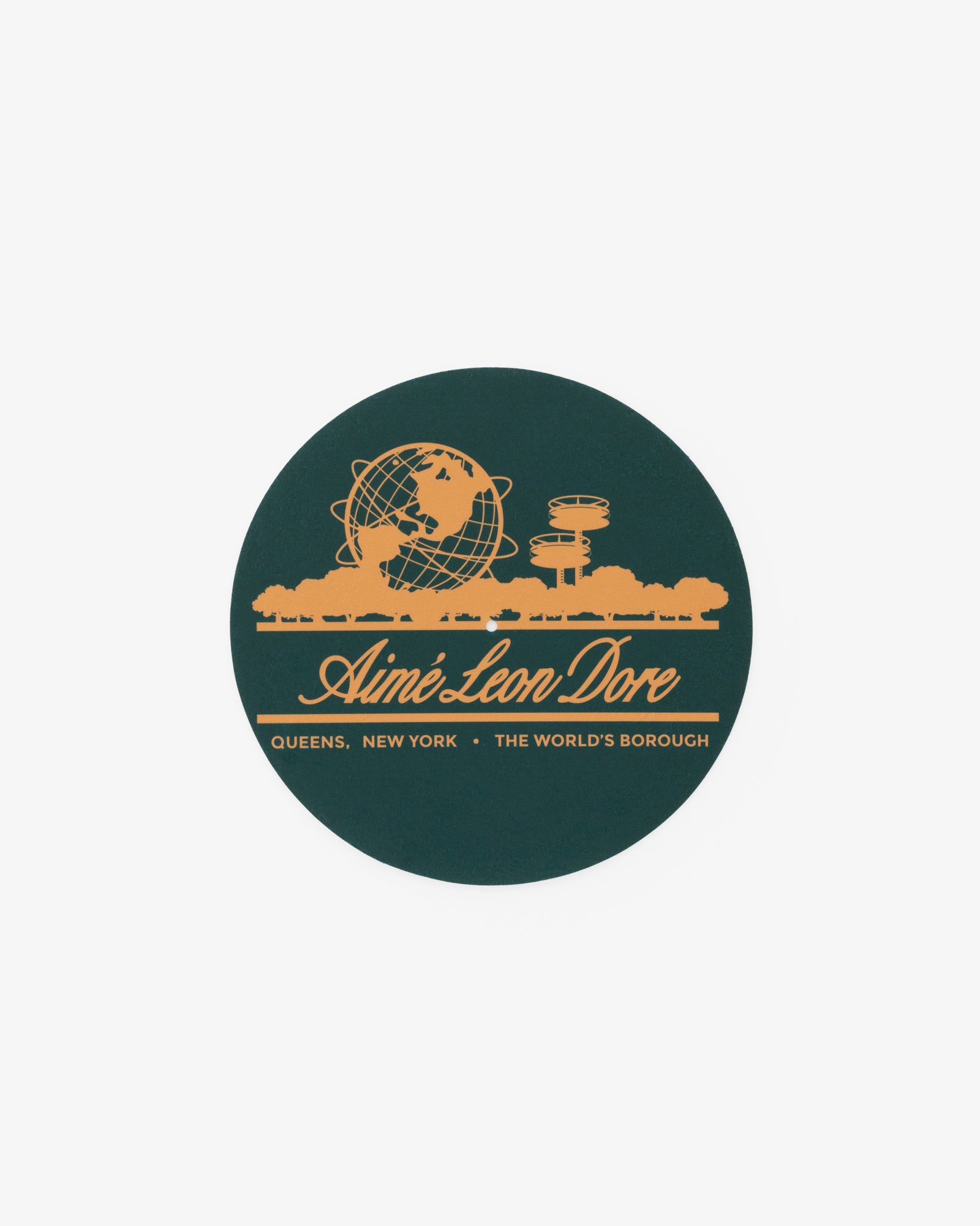 Unisphere Slip Mat featuring yellow Aimé Leon Dore logo and Queens, NY landmarks on a dark green background.