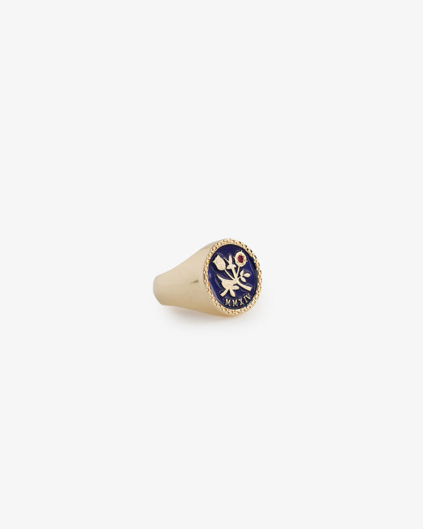 14Kt Queens Crest Ring with blue circular face, winged figure, and Greek letters in gold.