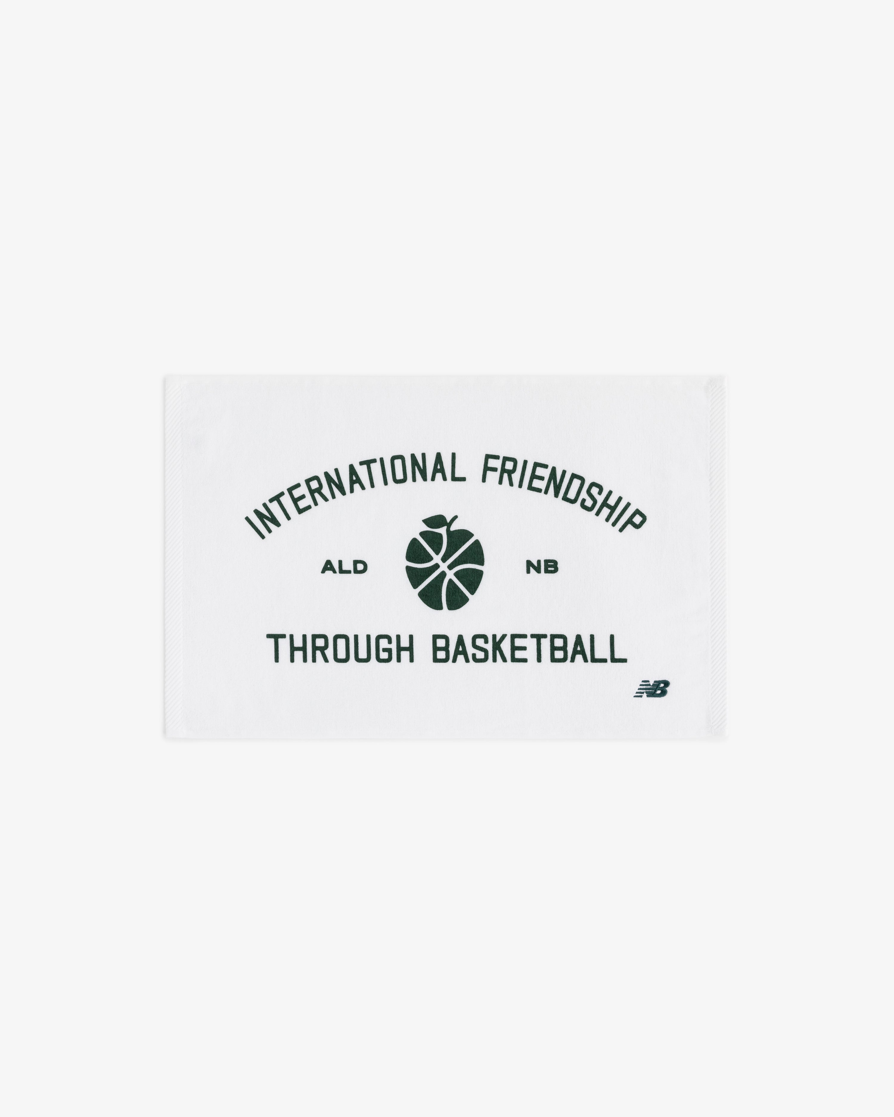 ALD / New Balance SONNY NY Game Towel with “International Friendship Through Basketball” and center basketball graphic.