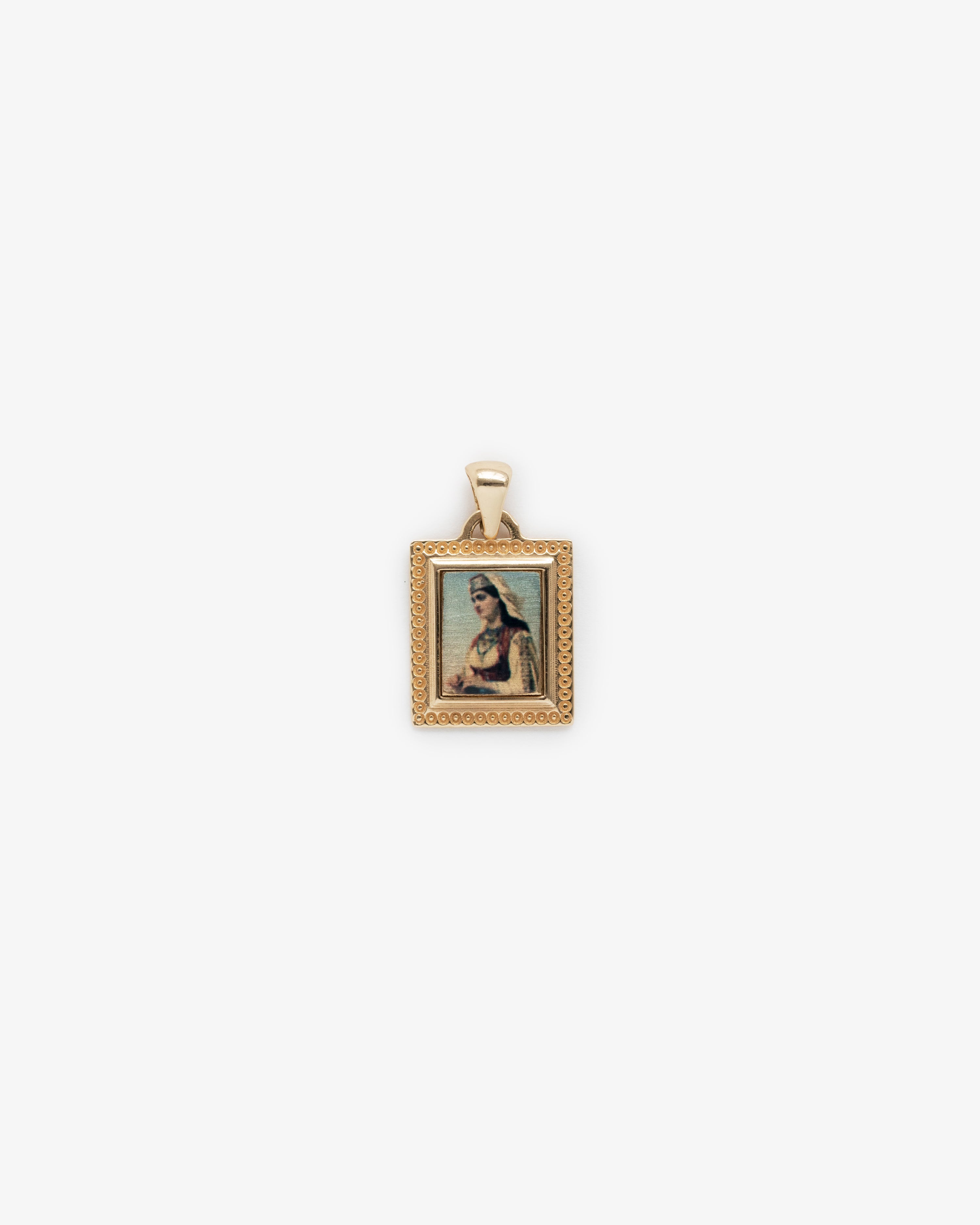 14Kt Gold Pendant featuring a rectangular frame with a painted person in a robe on a white background.