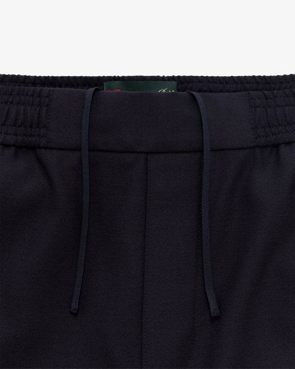 Close-up of Tropical Wool Elasticated Waist Suit Trouser with drawstring, visible waistband, and front seam detail.