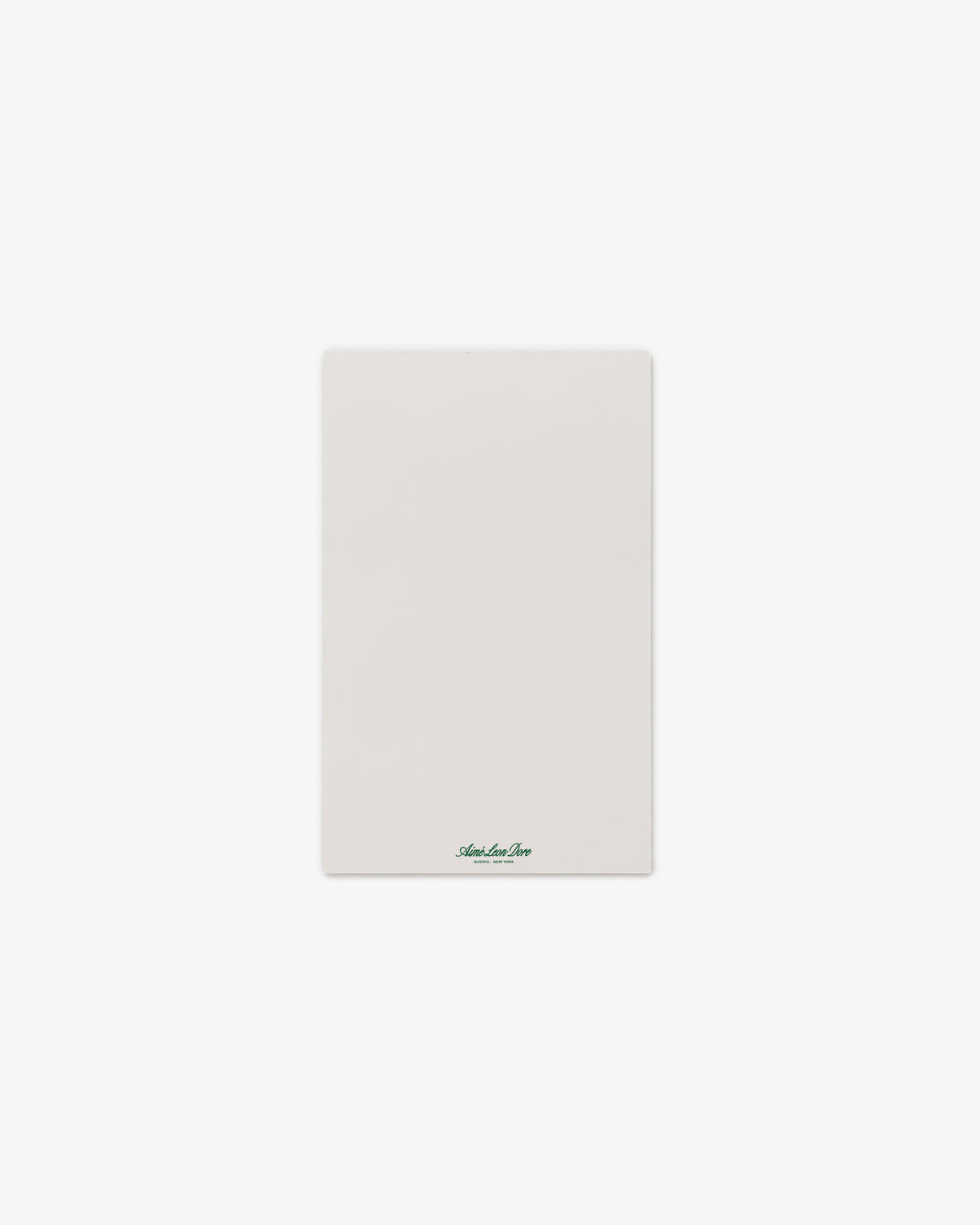 A Small Sketch Pad with a blank white sheet and a small green logo at the bottom center.