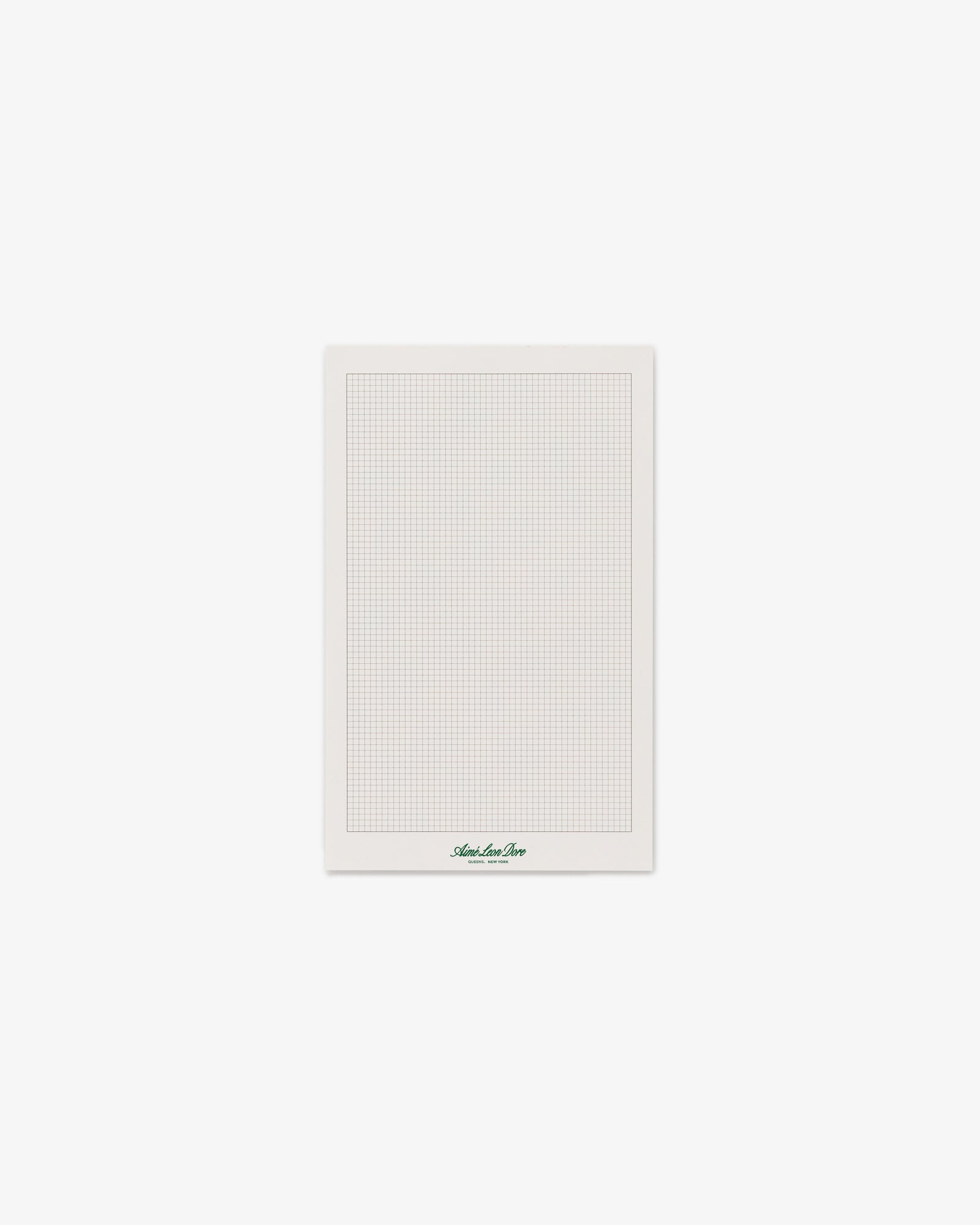 A single sheet from the Small Sketch Pad, white with small grid lines and a logo at the bottom center.